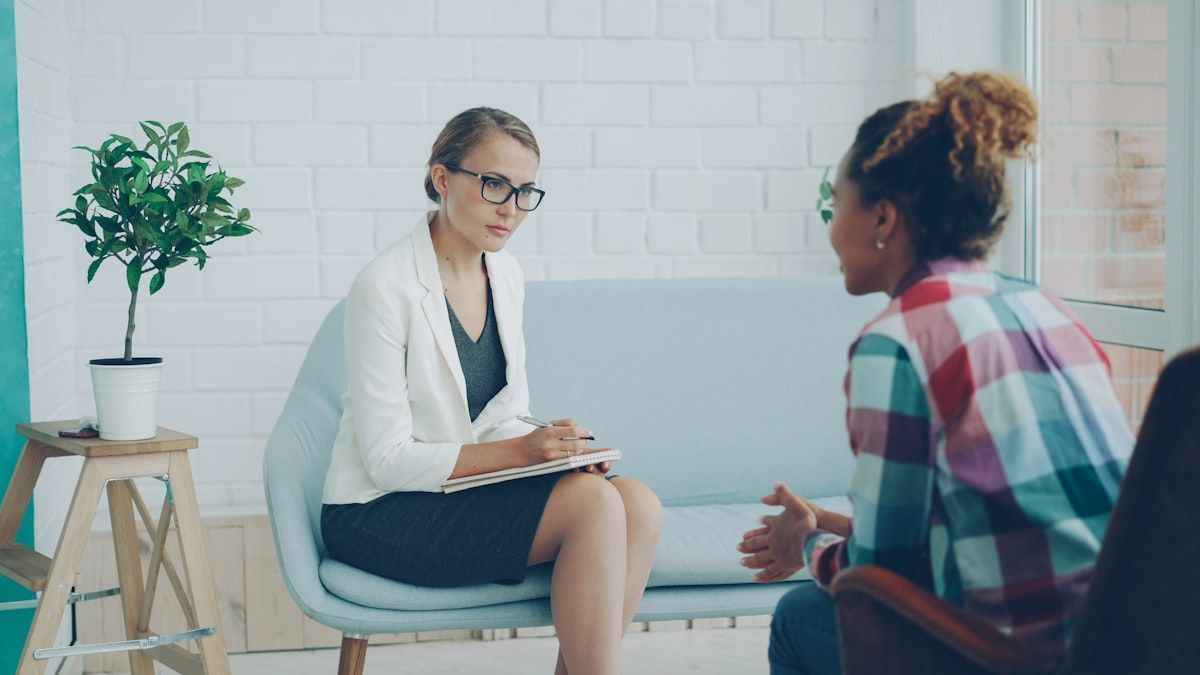 A therapist listening carefully during a trauma-focused session