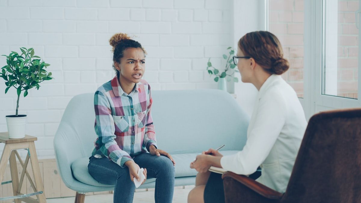 A supportive therapy session in a calm room
