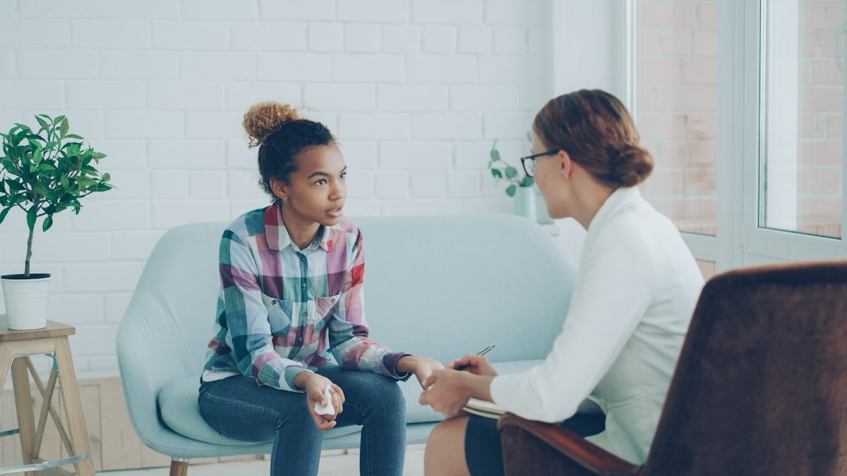 A patient speaking during a therapy session